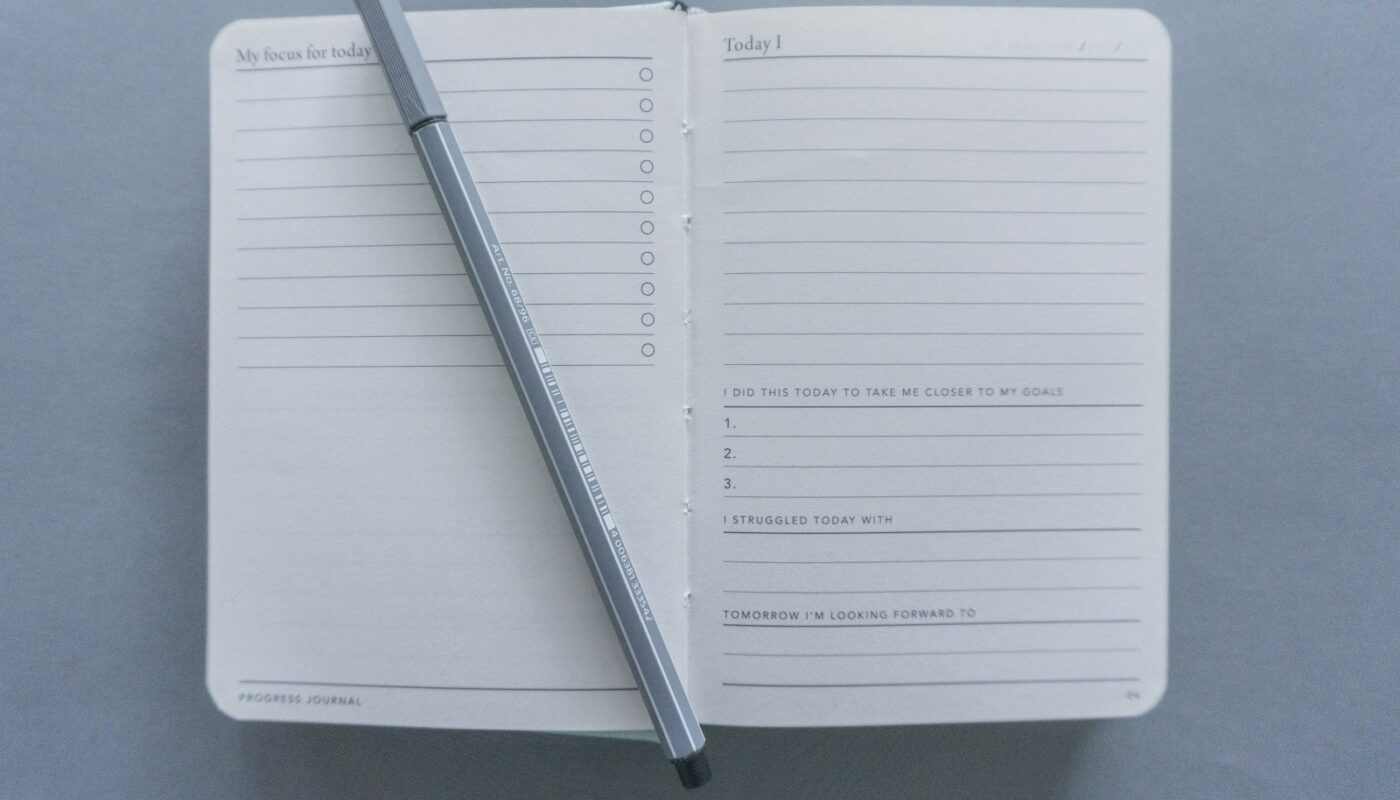 white printer paper with black pen